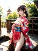 A woman in a red kimono sitting on a wooden bench.